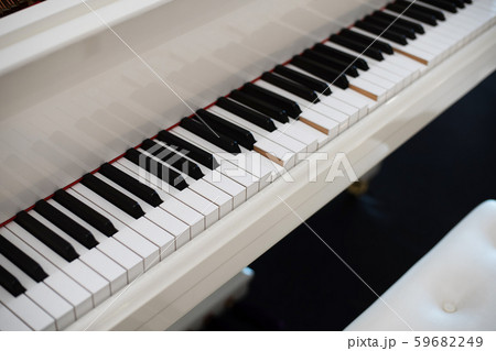 White Piano and Piano keyboard as music and 59682249