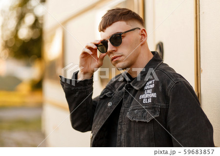 Stylish young man in black fashion glasses 59683857