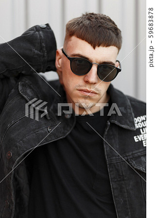 Handsome young man American model with a hairstyle Handsome young man American model with a hairstyle 59683878