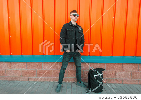 Handsome young man model with black sunglasses 59683886