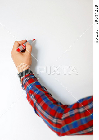 Male hand with a red marker writes Male hand with a red marker writes 59684229