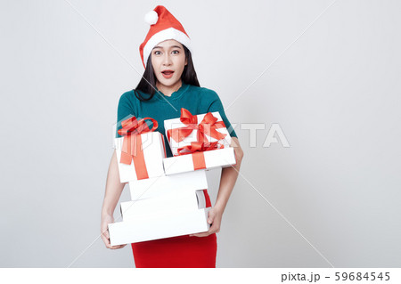 Woman Holding Gift Box Christmas on white Woman Holding Gift Box Christmas on white 59684545