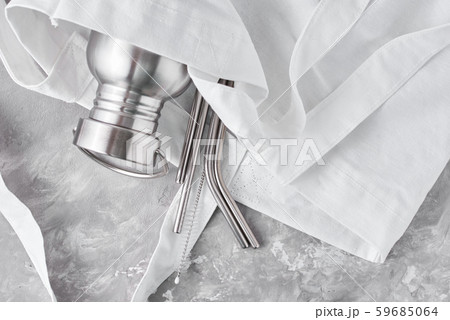Aluminum bottle and metal tubes in cotton bag 59685064
