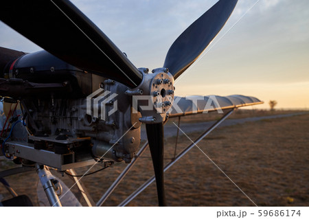 Propeller and internal combustion engine of an ultralight aircraft, close-up 59686174