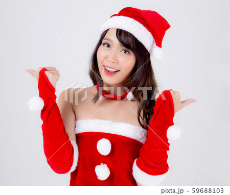 Beautiful portrait young asian woman Santa costume wear hat smiling with happy in holiday xmas 59688103