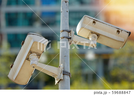 CCTV camera concept with facade of business CCTV camera concept with facade of business 59688847