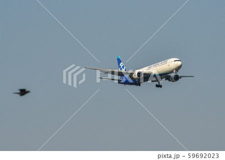 Airplane landing at Bangkok Airport Airplane landing at Bangkok Airport 59692023