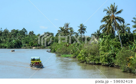 Wooden boats carrying flowers Wooden boats carrying flowers 59692419