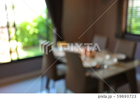 dish ware sets arrange on dining table inside eating room of home, image blur background dish ware sets arrange on dining table inside eating room of home, image blur background 59693723