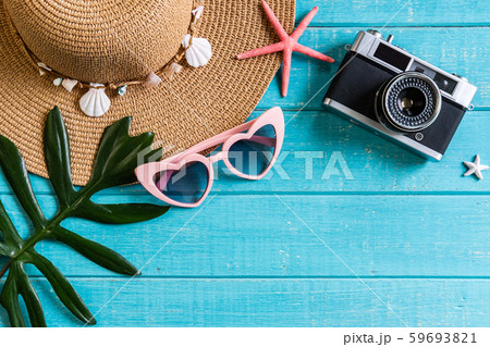 Travel accessories items on wooden background, Travel accessories items on wooden background, 59693821
