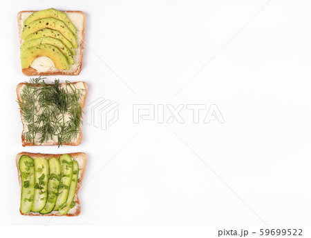 Set with toast bread and different toppings on Set with toast bread and different toppings on 59699522