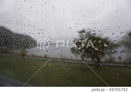 Drops of rain on the windowpane Drops of rain on the windowpane 59705782