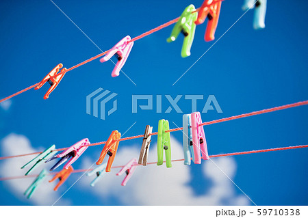 Multi-colored clothespins, in the Dominican Republic. sunny positive image 59710338