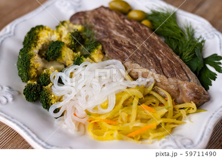 Grilled cooked beef meat, broccoli, vegetable Grilled cooked beef meat, broccoli, vegetable 59711490
