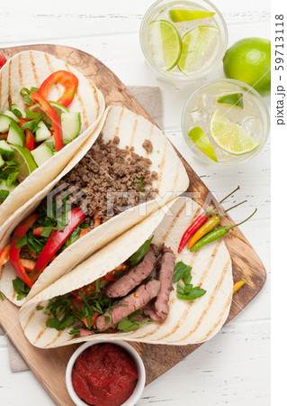 Mexican tacos and caipirinha cocktail 59713118