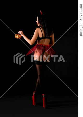 Show girl in sexy lingerie full-length rearview Show girl in sexy lingerie full-length rearview 59713388