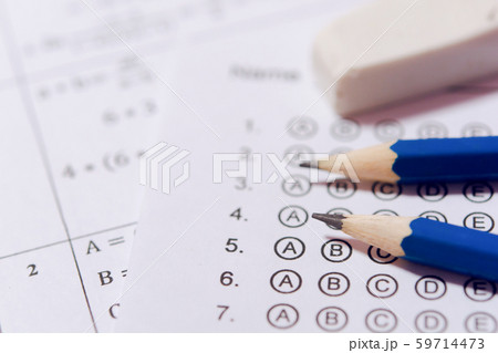 Pencil and eraser on answer sheets or Standardized 59714473