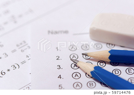 Pencil and eraser on answer sheets or Standardized 59714476