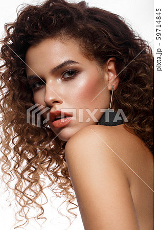 Beautiful sexy girl with bright makeup and curls hair. Beauty face. Beautiful sexy girl with bright makeup and curls hair. Beauty face. 59714845