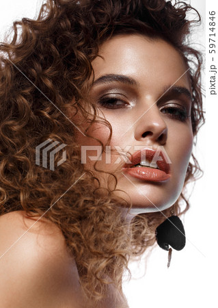 Beautiful sexy girl with bright makeup and curls hair. Beauty face. Beautiful sexy girl with bright makeup and curls hair. Beauty face. 59714846