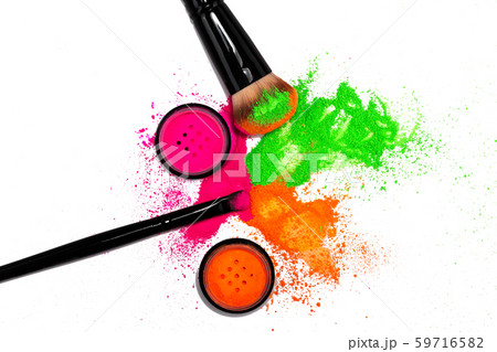 Cheek brush with neon cosmetic powder colorful pile on white background 59716582
