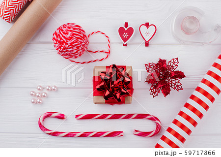 Christmas decoration and wrapped presents on wood. Christmas decoration and wrapped presents on wood. 59717866