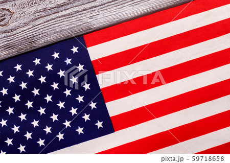Close up flag of USA on wooden background. 59718658