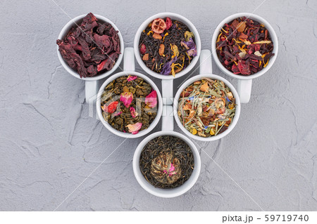 Flat lay composition with different types of dry tea leaves. 59719740