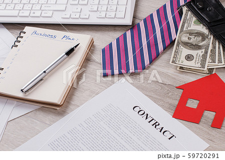 Tie, money and paper house. Tie, money and paper house. 59720291