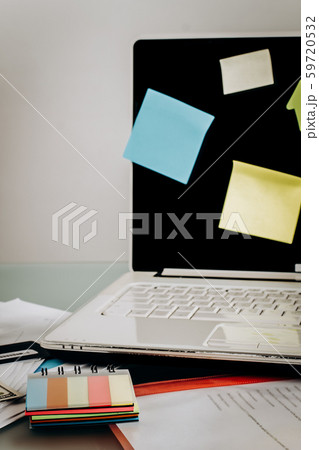 Reminders and laptop close up. 59720532