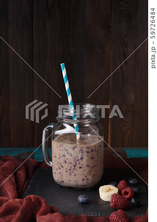Image of jar with smoothie on table Image of jar with smoothie on table 59726484