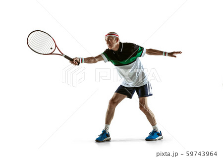 Senior man playing tennis in sportwear isolated on white background Senior man playing tennis in sportwear isolated on white background 59743964