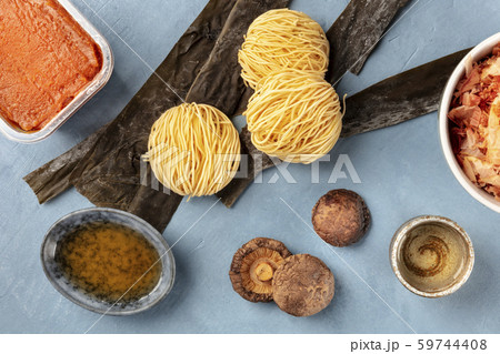 Ramen ingredients. Dried sea vegetable kelp, soba noodles, miso paste, bonito tuna flakes, shiitake 59744408