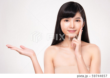 Beautiful Young Asian Woman with Clean Fresh Skin. Beautiful Young Asian Woman with Clean Fresh Skin. 59744657