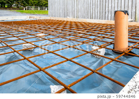Metal reinforcement grid and wood frame for reinforced concrete basement construction Metal reinforcement grid and wood frame for reinforced concrete basement construction 59744846