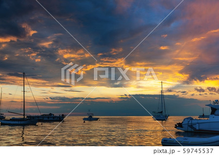 Sunset at boat marina with dramatic sky 59745537