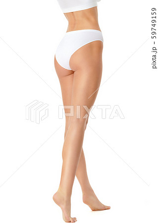 Slim woman's legs isolated on white background Slim woman's legs isolated on white background 59749159