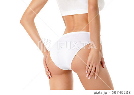 Slim woman's legs isolated on white background Slim woman's legs isolated on white background 59749238