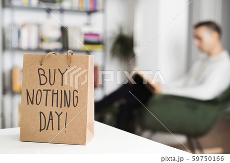 text buy nothing day in a shopping bag. 59750166
