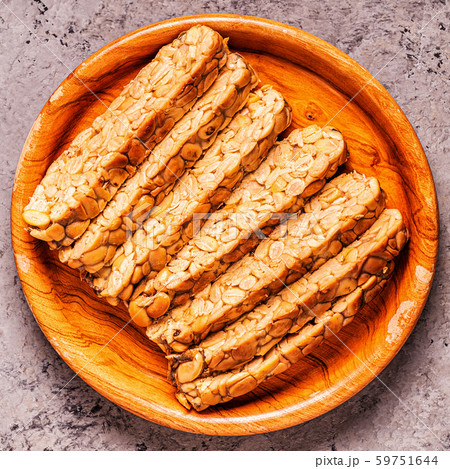 Sliced fresh raw tempeh, traditional Indonesian Sliced fresh raw tempeh, traditional Indonesian 59751644