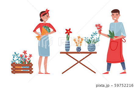 Floristry Concept. Flower Arrangers Taking Care of Plants and Flowers 59752216
