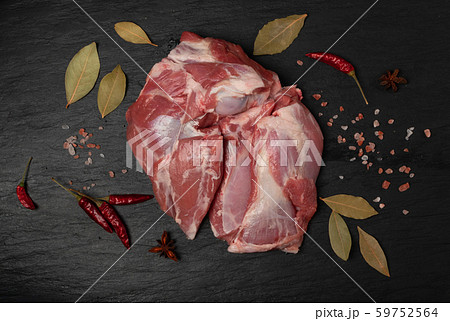 Fresh raw beef steak on black stone background 59752564
