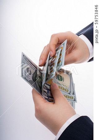Businessman holding US dollar banknote money 59753846