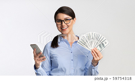 Businesswoman Holding Phone And Money Standing On White Background, Panorama 59754318