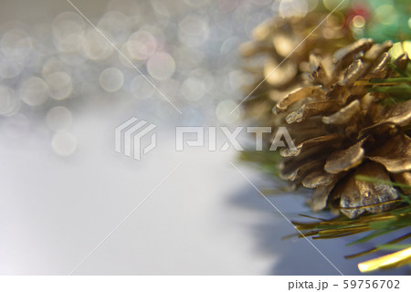 pine cones and green sparkling shapes forming a 59756702