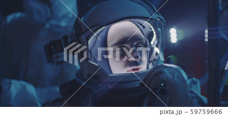 Astronaut and scientists testing spacesuit 59759666