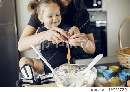 Family cook the dough for cookies Family cook the dough for cookies 59762726