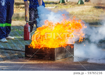 Firefighters show demonstration Fire fighting Firefighters show demonstration Fire fighting 59765236