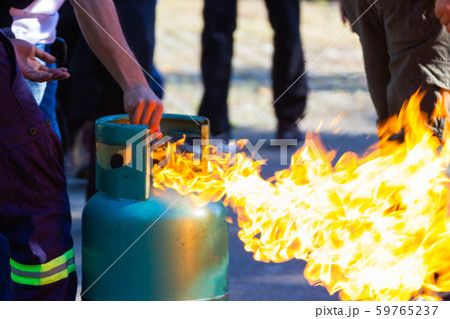Firefighters show demonstration Fire fighting  59765237