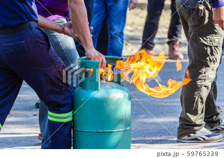 Firefighters show demonstration Fire fighting Firefighters show demonstration Fire fighting 59765239